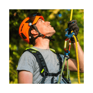Man using Phoenix 8mm Eye to Eye Hitch Cord while climbing, showcasing safety gear and rope access techniques.