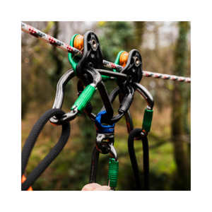 Close-up of Axis Rigging Swivels on a rope, showcasing their durable design for arborist and rescue applications.