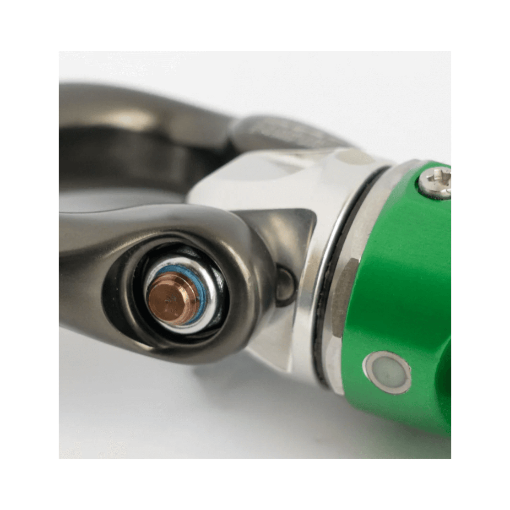Close-up of DMM Nexus Swivel, showcasing the titanium shackle detail and compact design.
