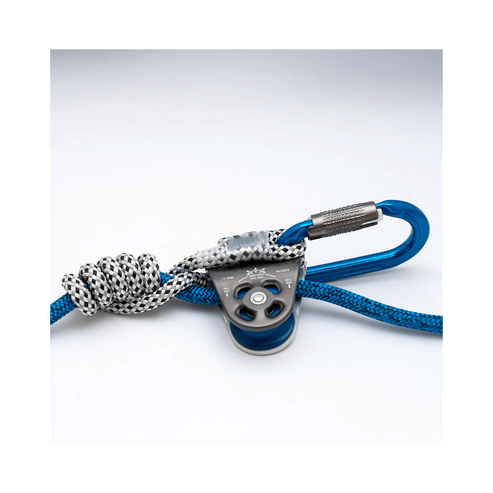 Nomad Friction Hitch Lanyard System with a pulley and carabiner for tree climbing.