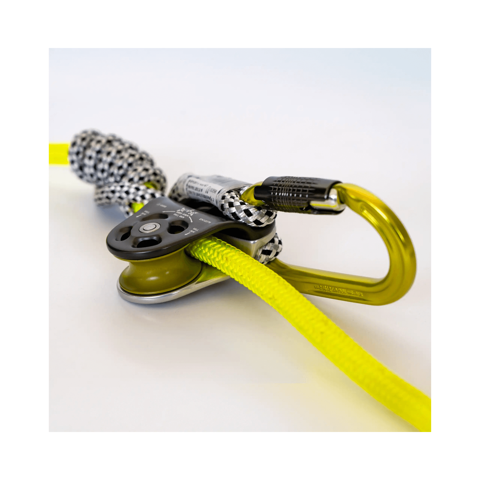 Nomad Friction Hitch Lanyard System components including rope, carabiner, and friction device for tree climbing.