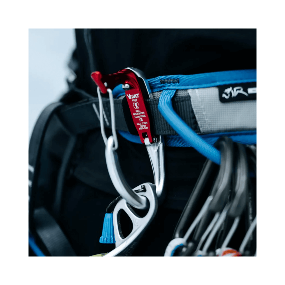 Vault Wire Gate Tool Clip attached to a harness, designed for arborists and tree surgeons for reliable tool storage.