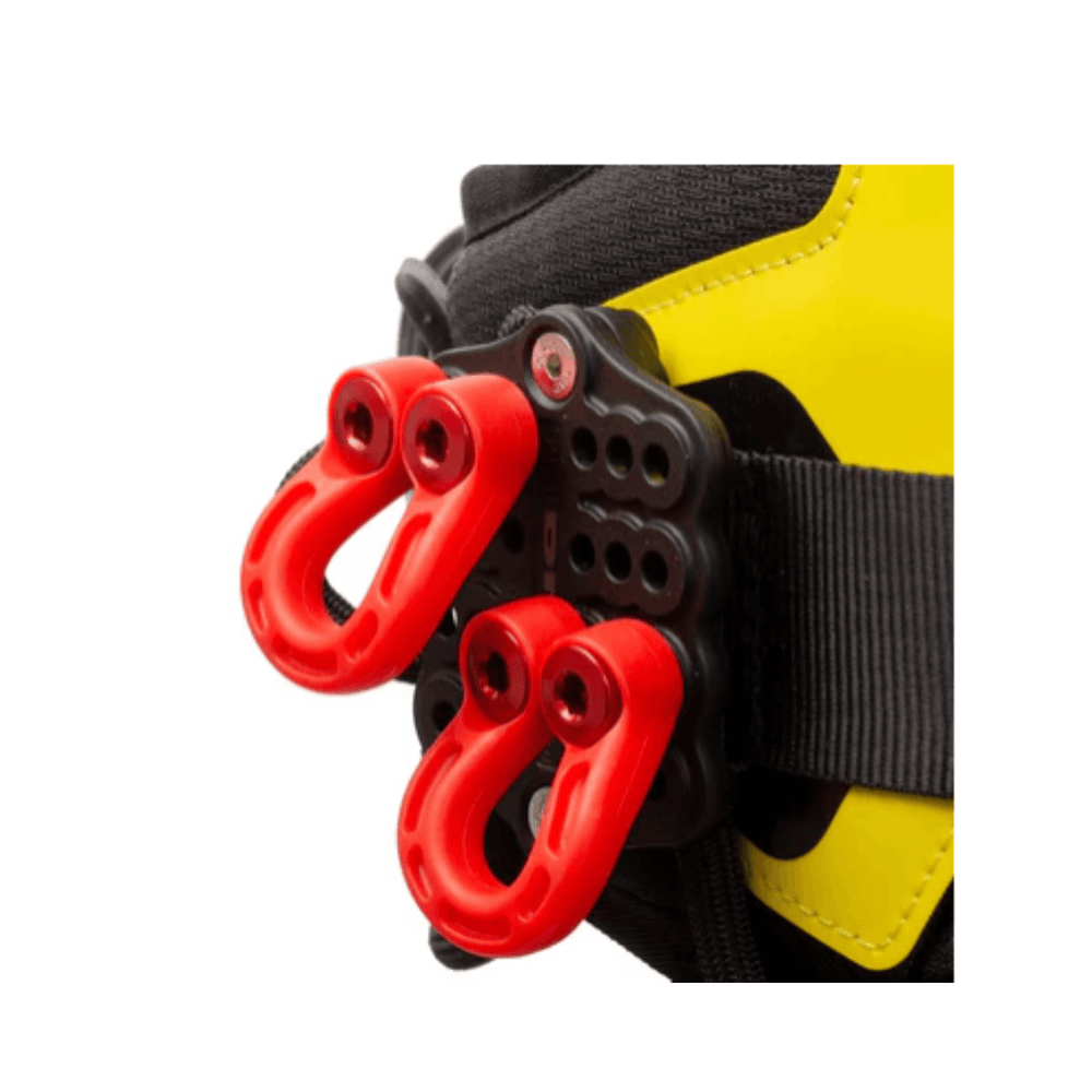 DMM Stowaway storage loops in red attached to a climbing harness for flexible organization and extra storage.