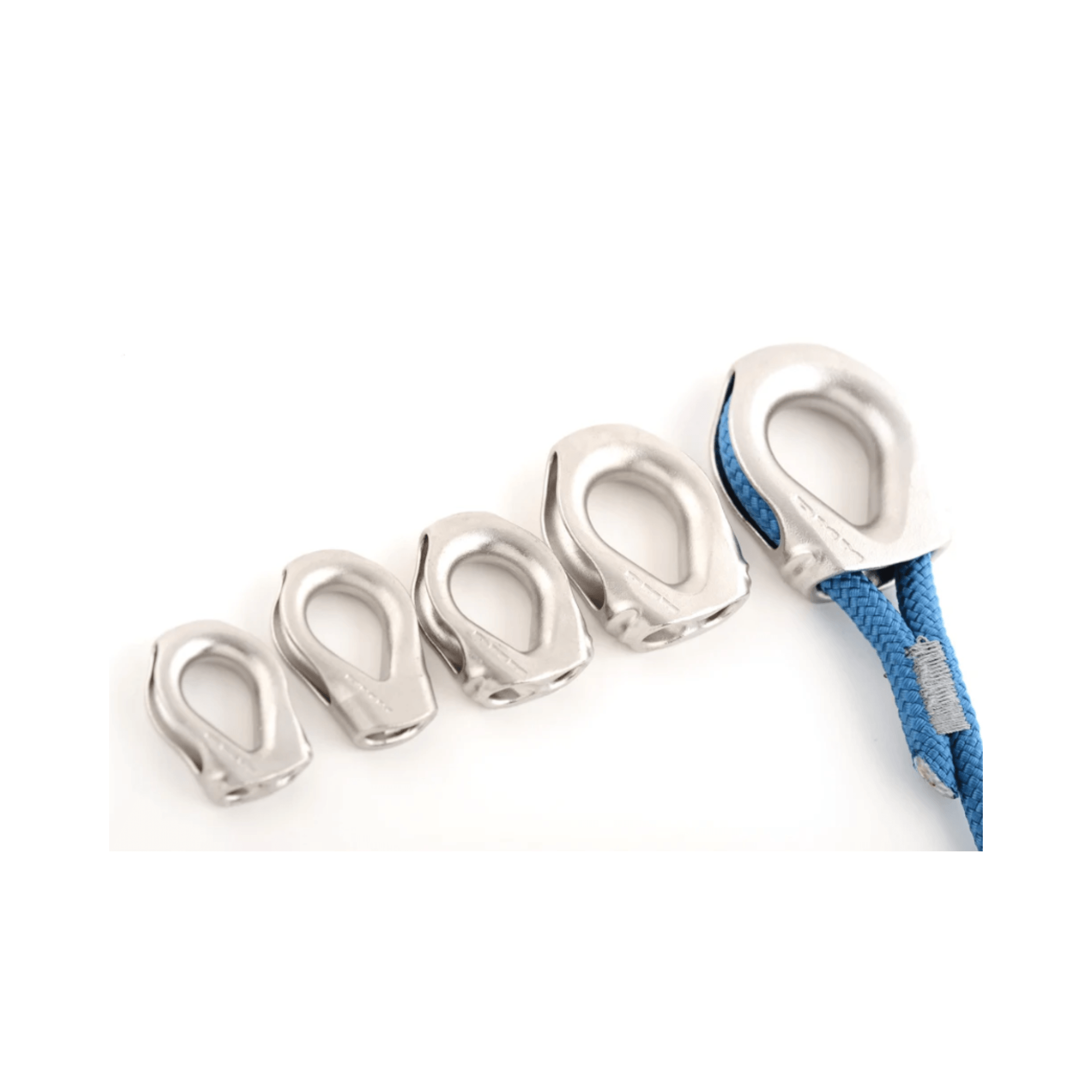 Thimble set showing various sizes of stainless steel thimbles for rope protection and load distribution.