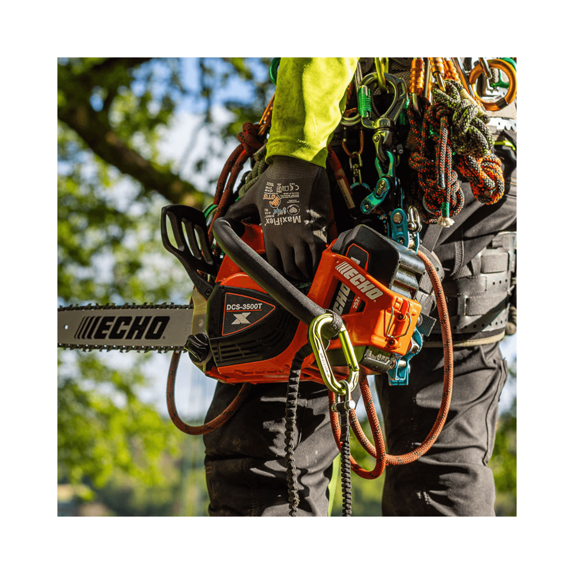 DCS-3500T Battery Top Handle Chainsaw 14" held by an arborist, showcasing its lightweight design for tree surgeons.
