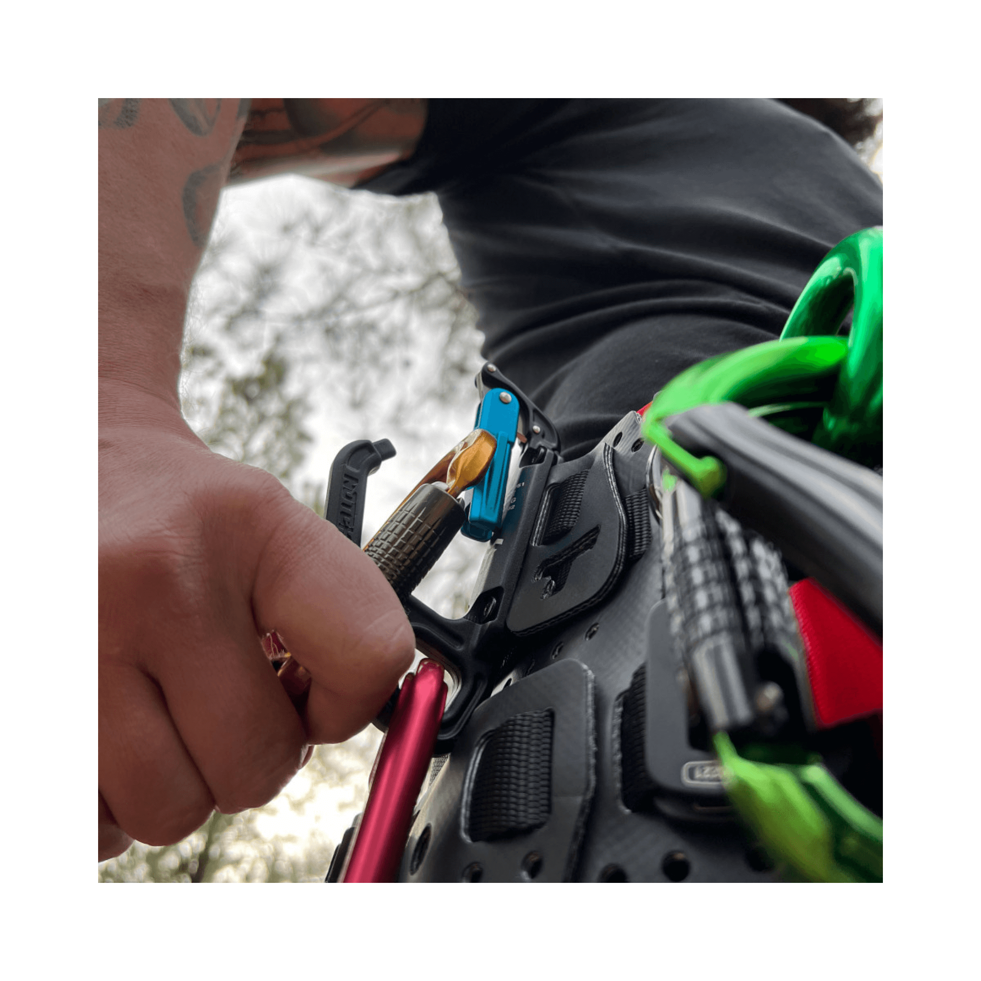 Close-up of a hand using the Notch Swinger Tool Clip, ideal for tree surgeons and arborists in action.