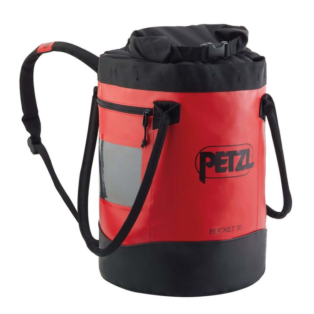 Petzl Bucket 30L climbing rope bag in red color, ideal for tree surgeons and climbing gear transport.