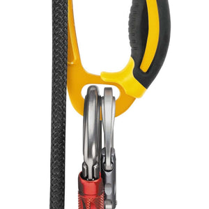 Petzl Ascension hand ascender with ergonomic grip and carabiners, ideal for tree surgeons and climbing.
