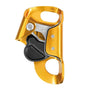 A gold-colored Petzl Croll Chest Ascender with a black catch area and stainless steel components.
