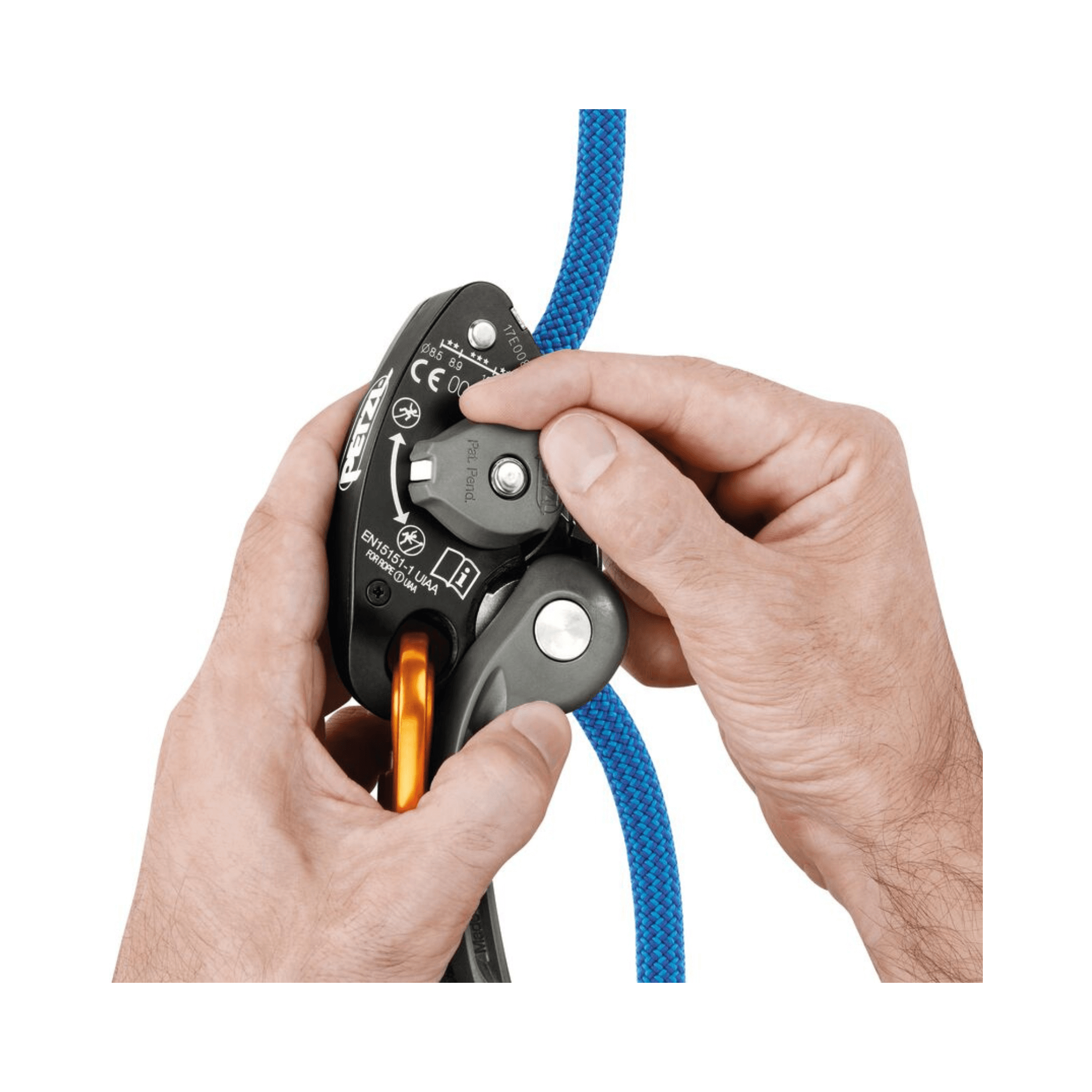 Hands using the PETZL GRIGRI® + belay device with blue rope, ideal for climbing and tree surgeon use.