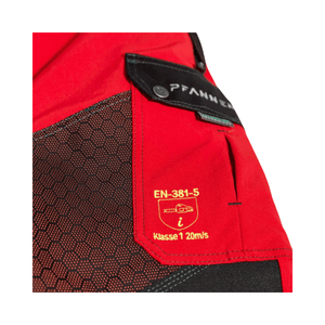 Close-up of Pfanner Gladiator Extreme Chainsaw Trousers Type A featuring safety label and durable material.