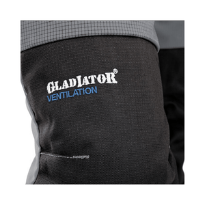 Close-up of Gladiator® Ventilation logo on Pfanner Ventilation Chainsaw Trousers Type A, showcasing quality fabric.