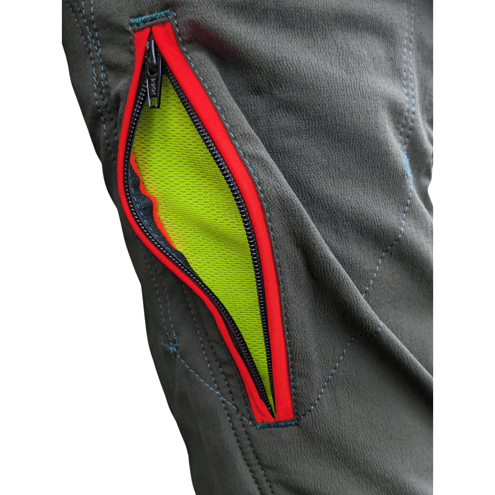Close-up of the pocket on Pfanner Arborist Chainsaw Trousers, featuring bright mesh lining for visibility and functionality.