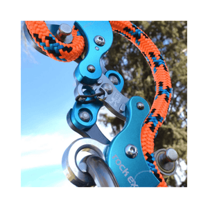 Close-up of the Akimbo Belay Device by Rock Exotica featuring bright orange rope.