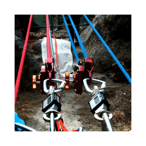 Enforcer Load Cell & Case showcased with rigging equipment in a natural setting for accurate load monitoring.