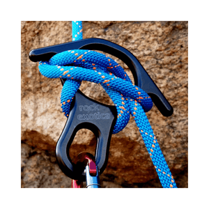 Rescue Eight Descender with rope and carabiner from Rock Exotica for rock climbing and rescue operations.