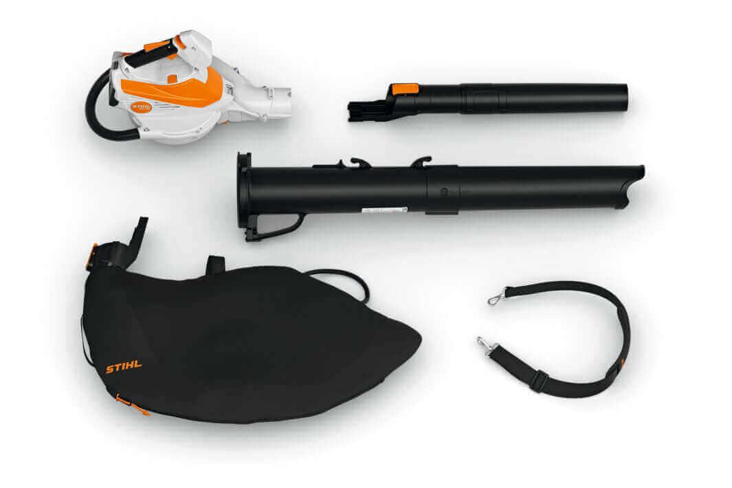 STIHL tree surgeon equipment including a blower, vacuum tube, and collection bag for efficient outdoor maintenance.