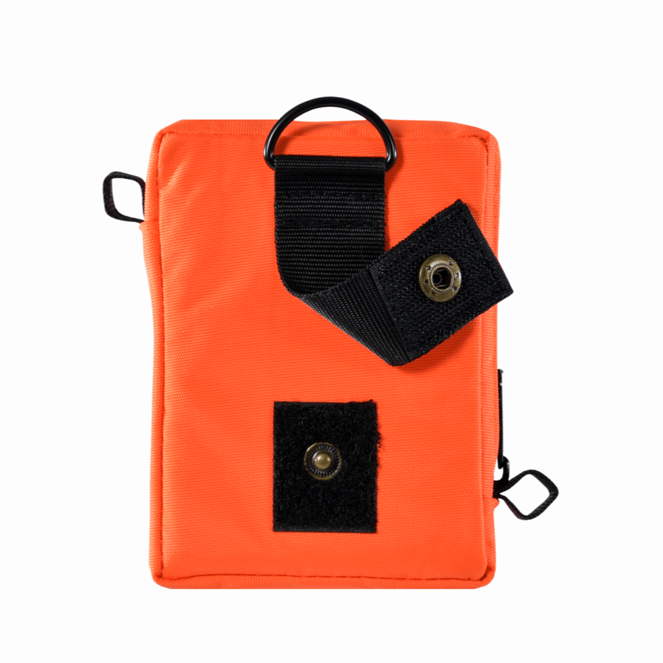 STEIN SOLO Plus personal first aid kit in vibrant orange color, ideal for tree surgeons and outdoor safety.