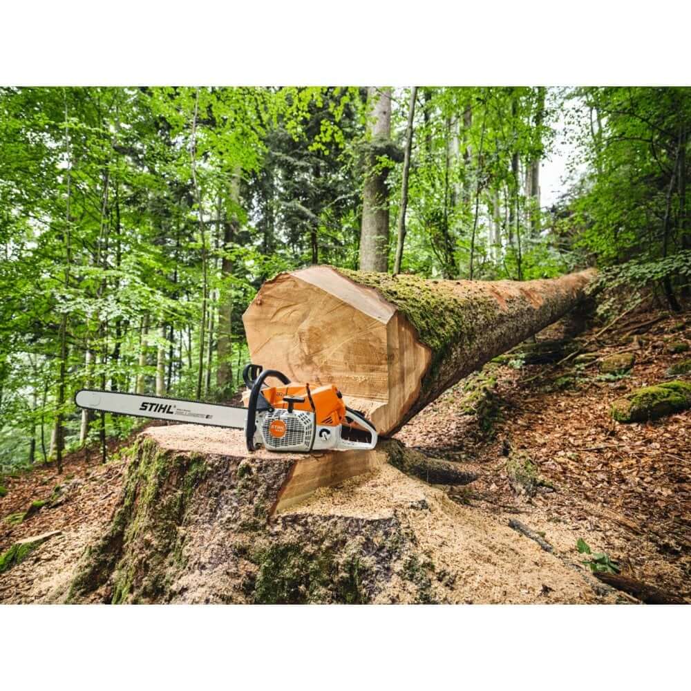 STIHL MS 881 Petrol Chainsaw on a felled tree, showcasing powerful performance for tree surgeons in forestry work.