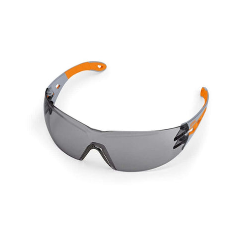STIHL Light Plus Safety Glasses with smoke lenses, ideal for tree surgeons and gardening, offering UV protection and clarity.