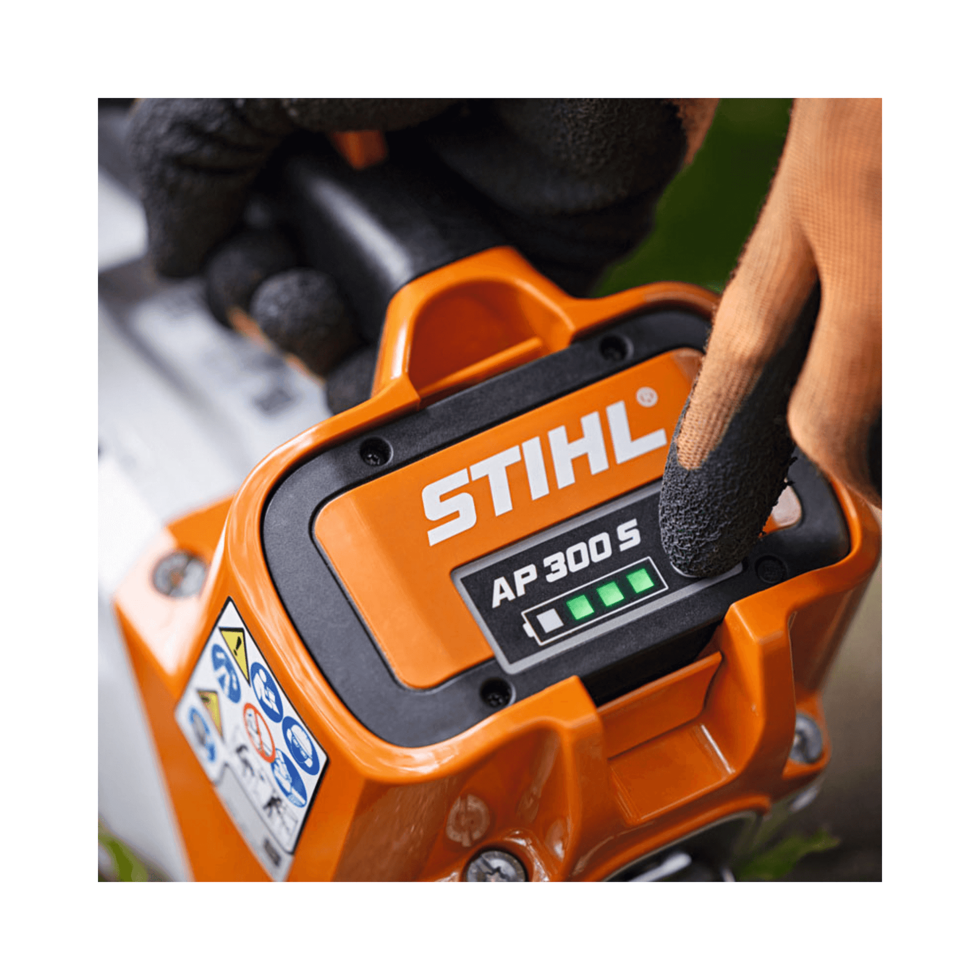Close-up of STIHL battery indicator on the MSA 220 T cordless chainsaw, showing power levels for tree surgeon use.