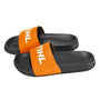 Pair of STIHL Pool Sliders by Gustharts. Black and orange, featuring the STIHL logo. Comfortable, slip-resistant footwear for poolside or casual wear