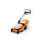 STIHL RMA 448 V cordless lawn mower. Self-propelled, orange and black, with grass collection bag. Used for cutting grass
