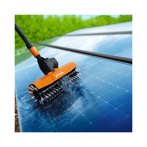 STIHL rotating brush cleaning solar panels, showcasing high-efficiency cleaning for delicate surfaces.