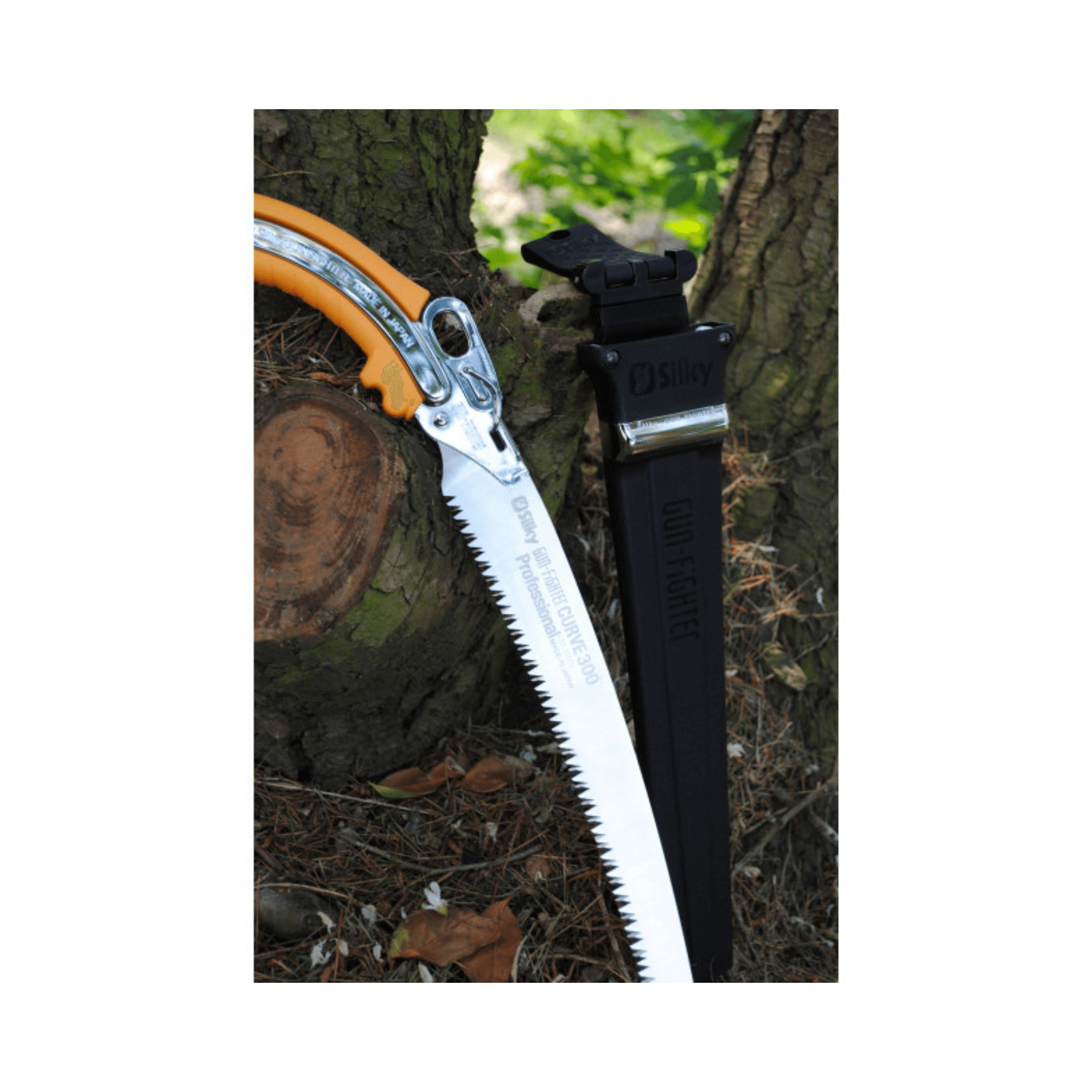 Gunfighter Curved Professional Pruning Saw displayed next to its protective sheath, showcasing premium pruning tools.