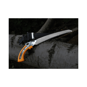 Gunfighter Curved Professional Pruning Saw resting on a log, showcasing its curved blade and ergonomic handle.