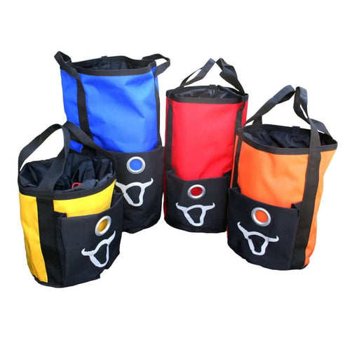 A collection of canvas rope bags in various sizes and colors including blue, red, orange, and yellow, with black as the primary color. Each bag has a drawstring closure and a front pocket, and is equipped with a strong metal loop for carrying.