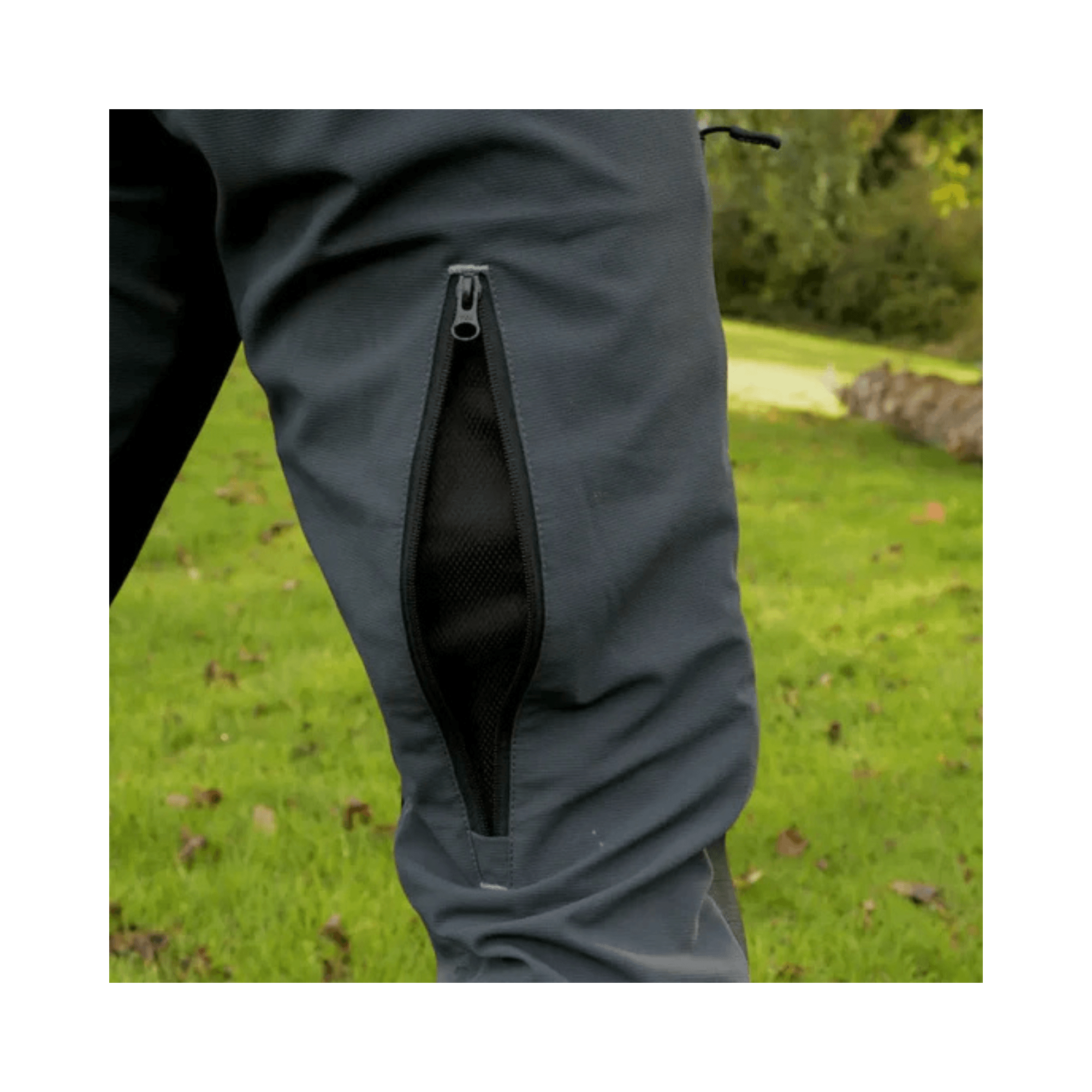 Side zipper detail of Sentinel Chainsaw Trousers Type A designed for tree surgeons and forestry workers.