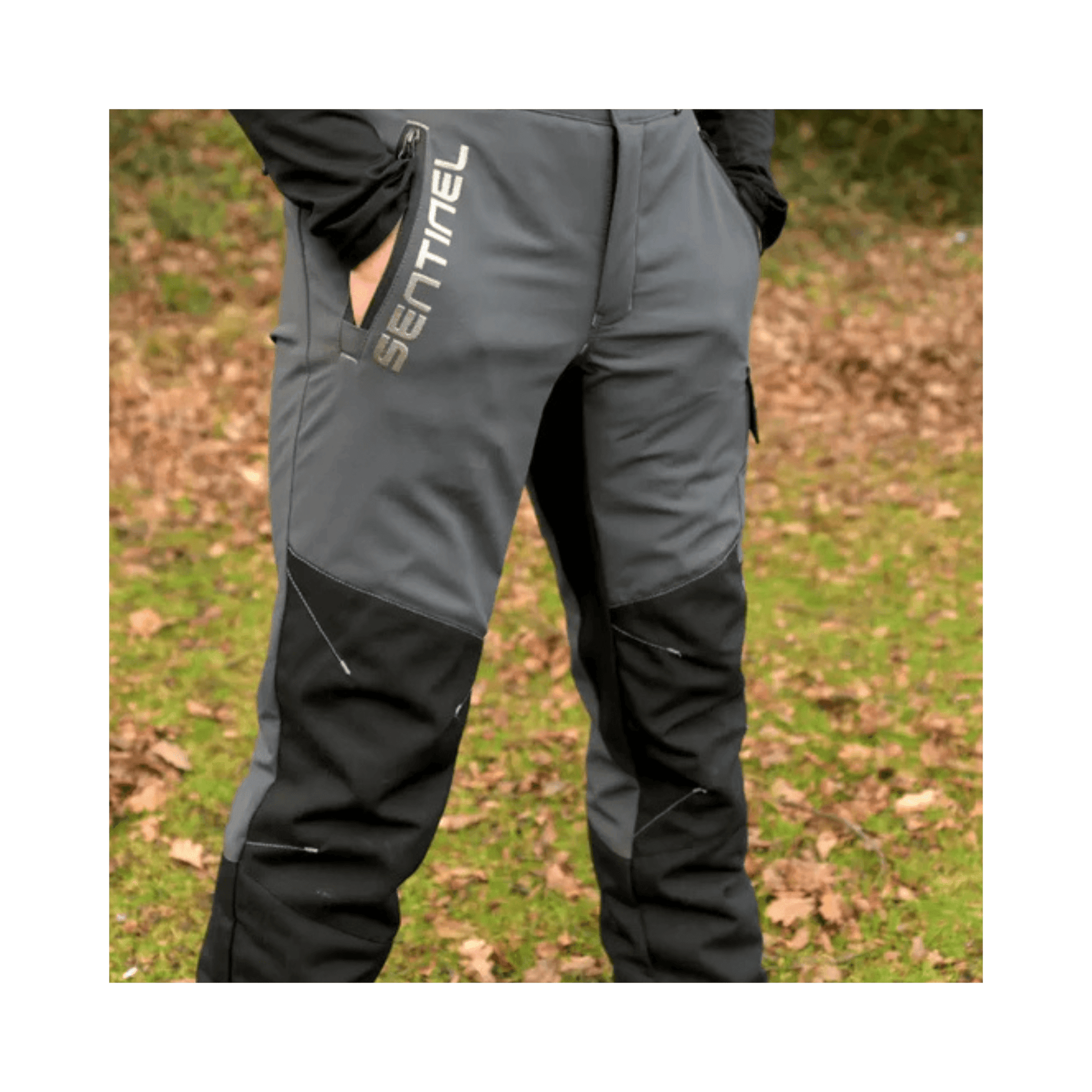 Sentinel Chainsaw Trousers Type A worn by a tree surgeon on a grassy background.