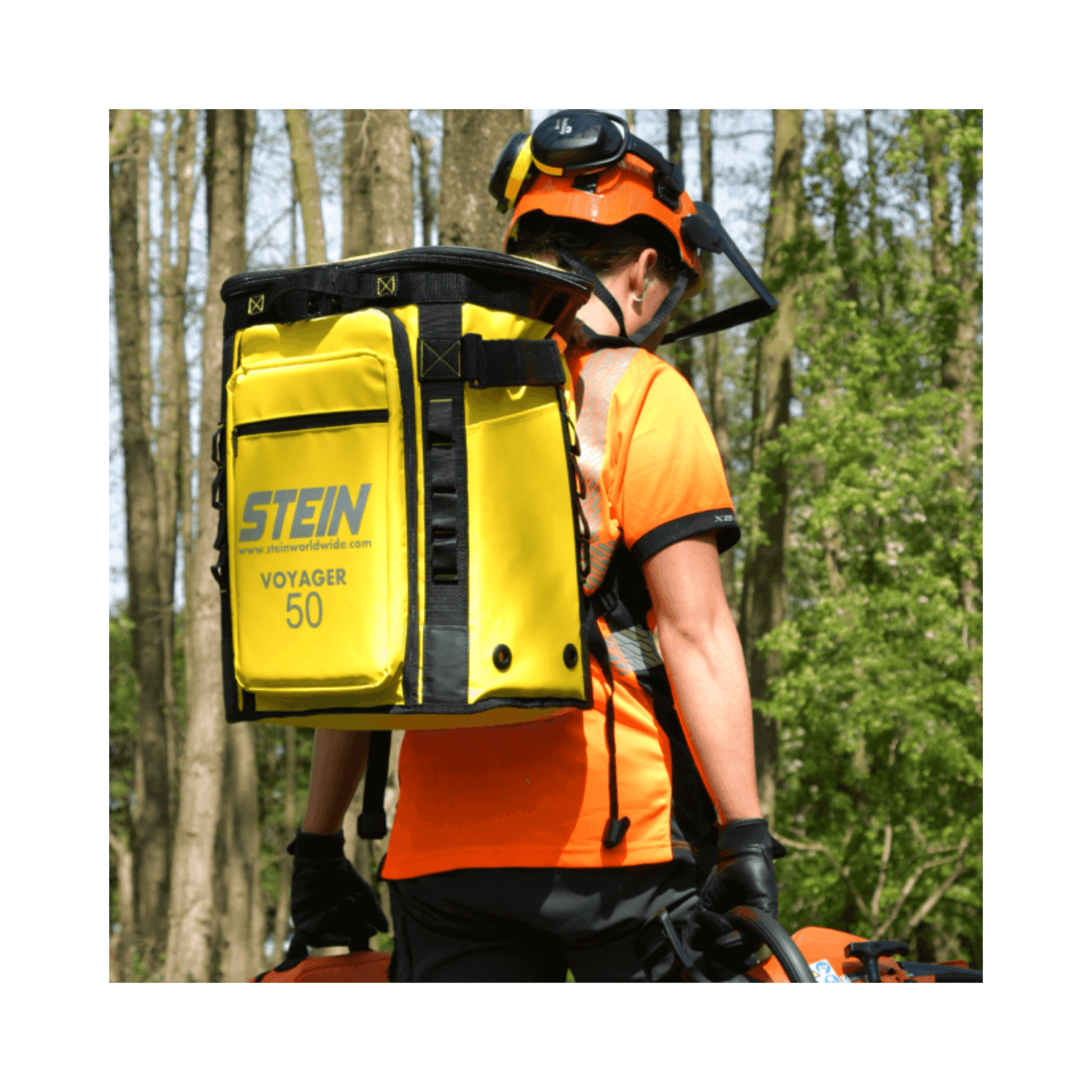 VOYAGER 50 Climbing Kit Storage Bag Blue on an arborist's back in a forest setting.