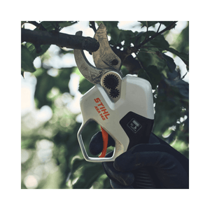 Close-up of ASA 140 Cordless Secateurs in use by a tree surgeon, perfect for arborists.
