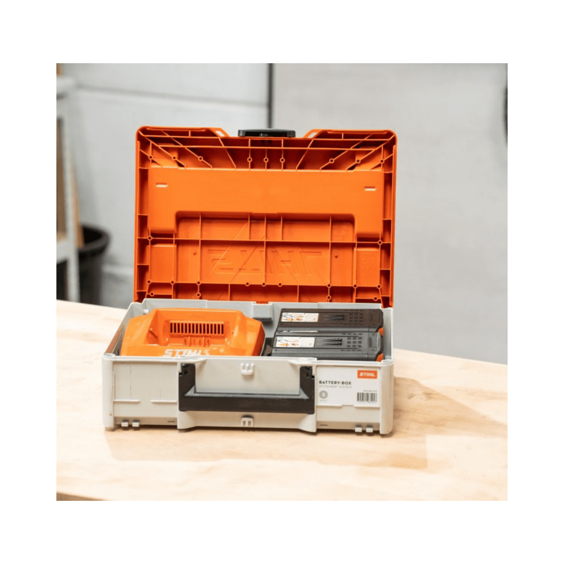 STIHL Battery Box Systainer System open, showcasing storage for battery-powered tools for tree surgeons.