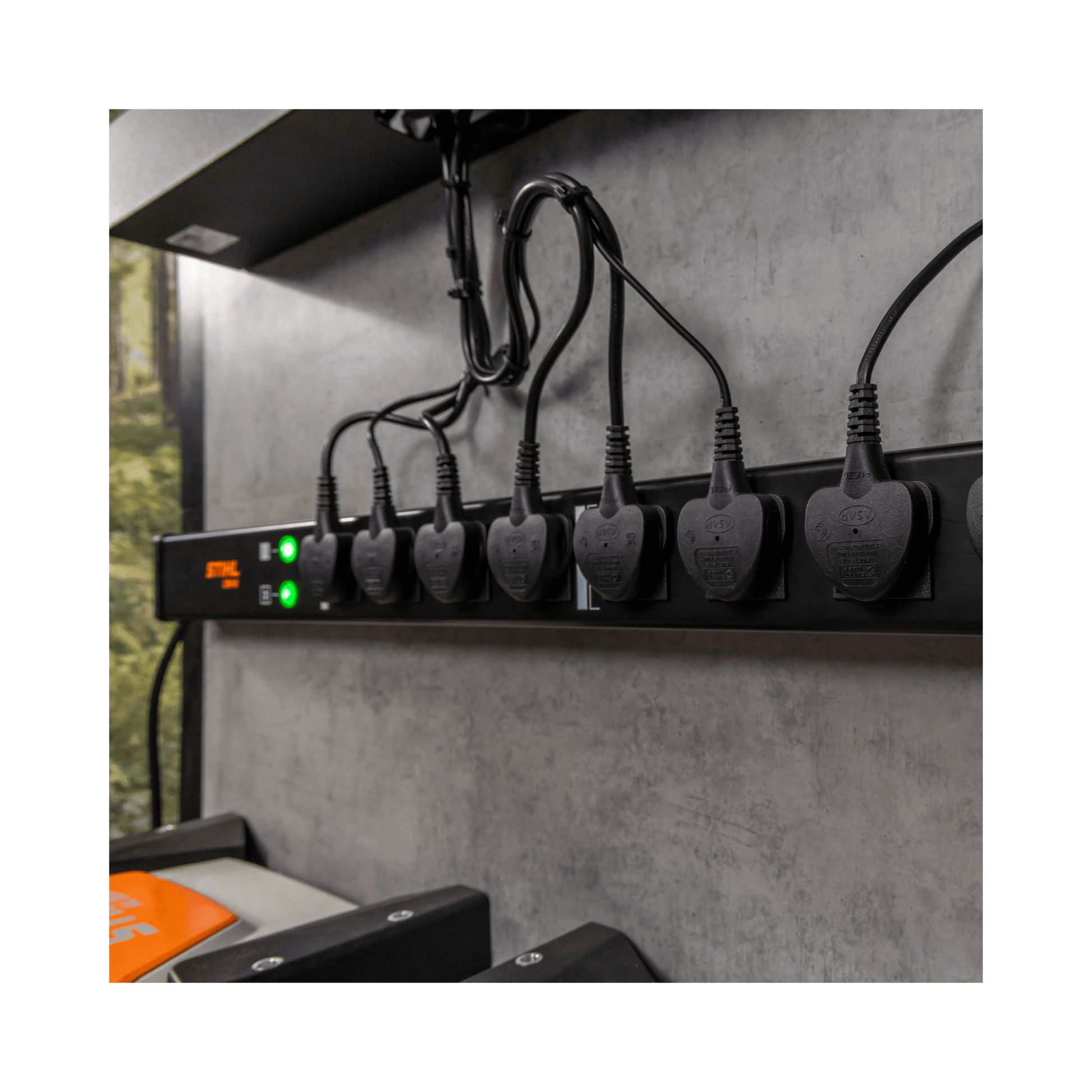 STIHL CM 8 Charging Management Solution with multiple chargers for efficient battery charging in workshops.