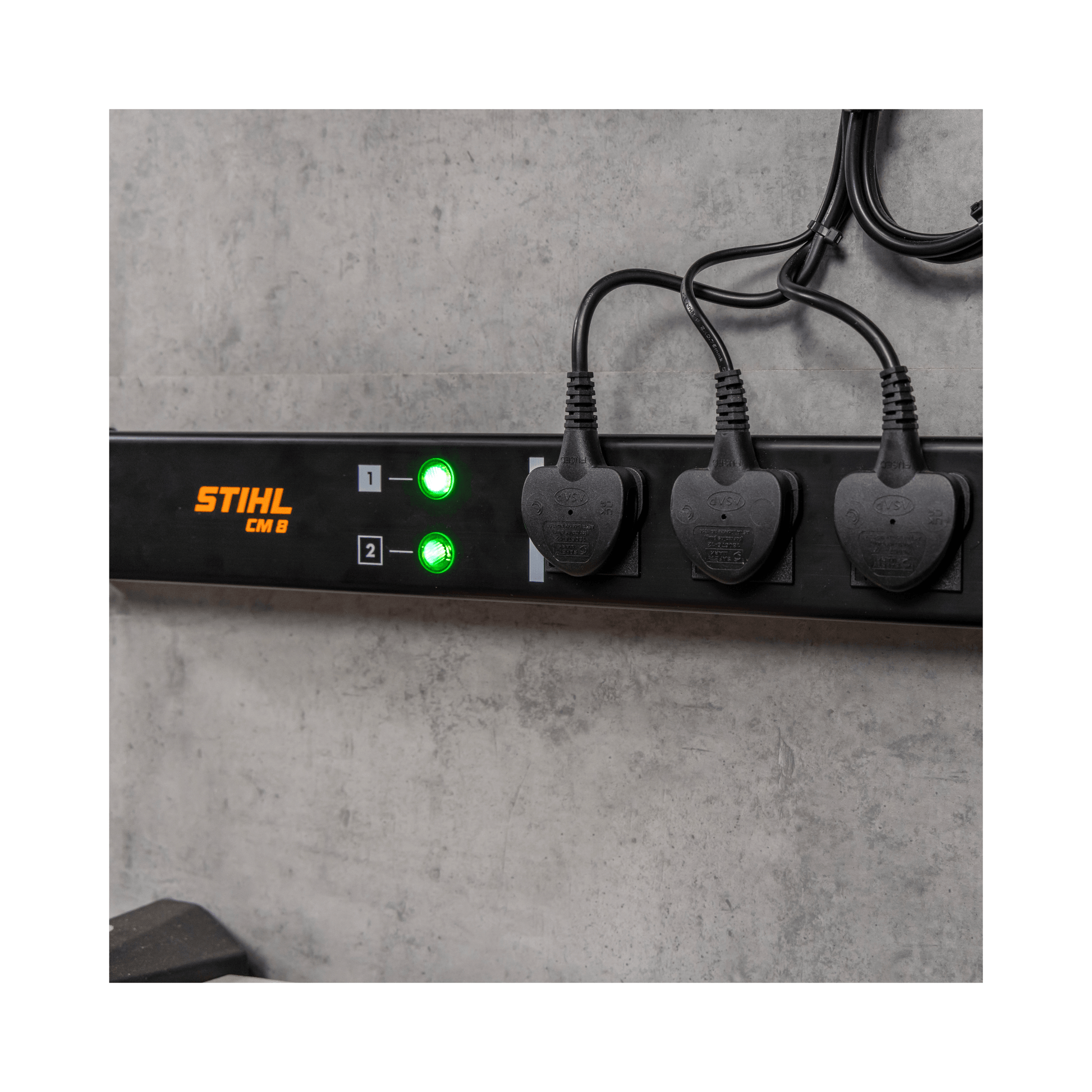 STIHL CM 8 Charging Management Solution with multiple chargers connected for efficient battery charging.