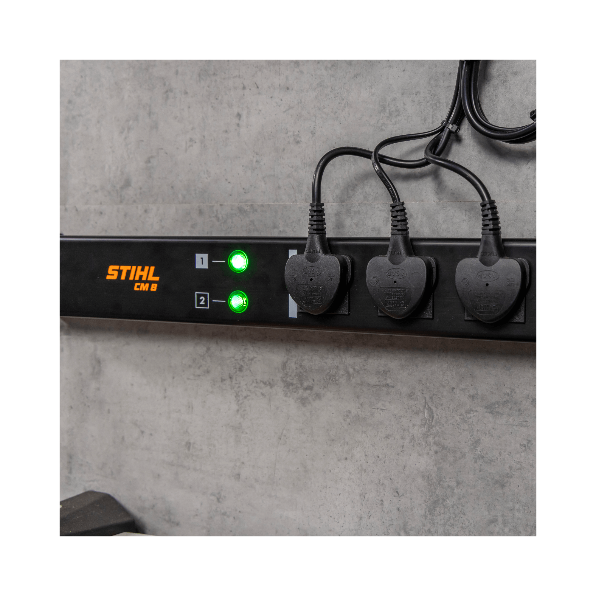 STIHL CM 8 Charging Management Solution with multiple chargers connected for efficient battery charging.