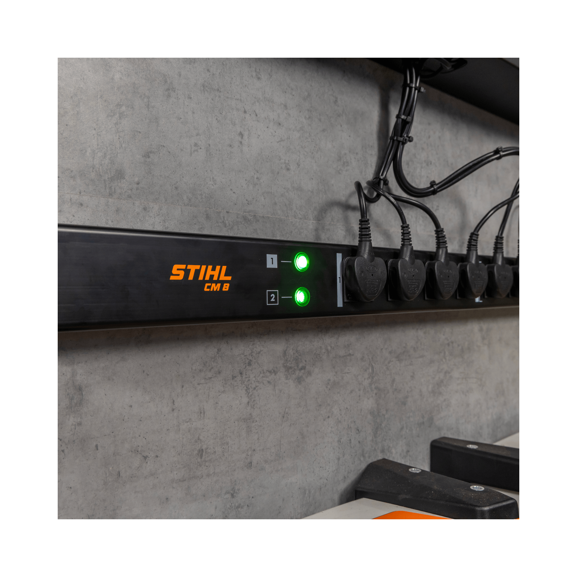 STIHL CM 8 Charging Management Solution with multiple chargers connected, designed for efficient battery charging.