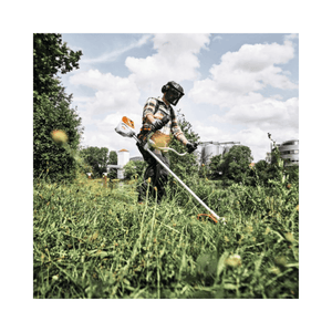 FSA 250 Cordless Brushcutter in use by a tree surgeon in a lush green area.