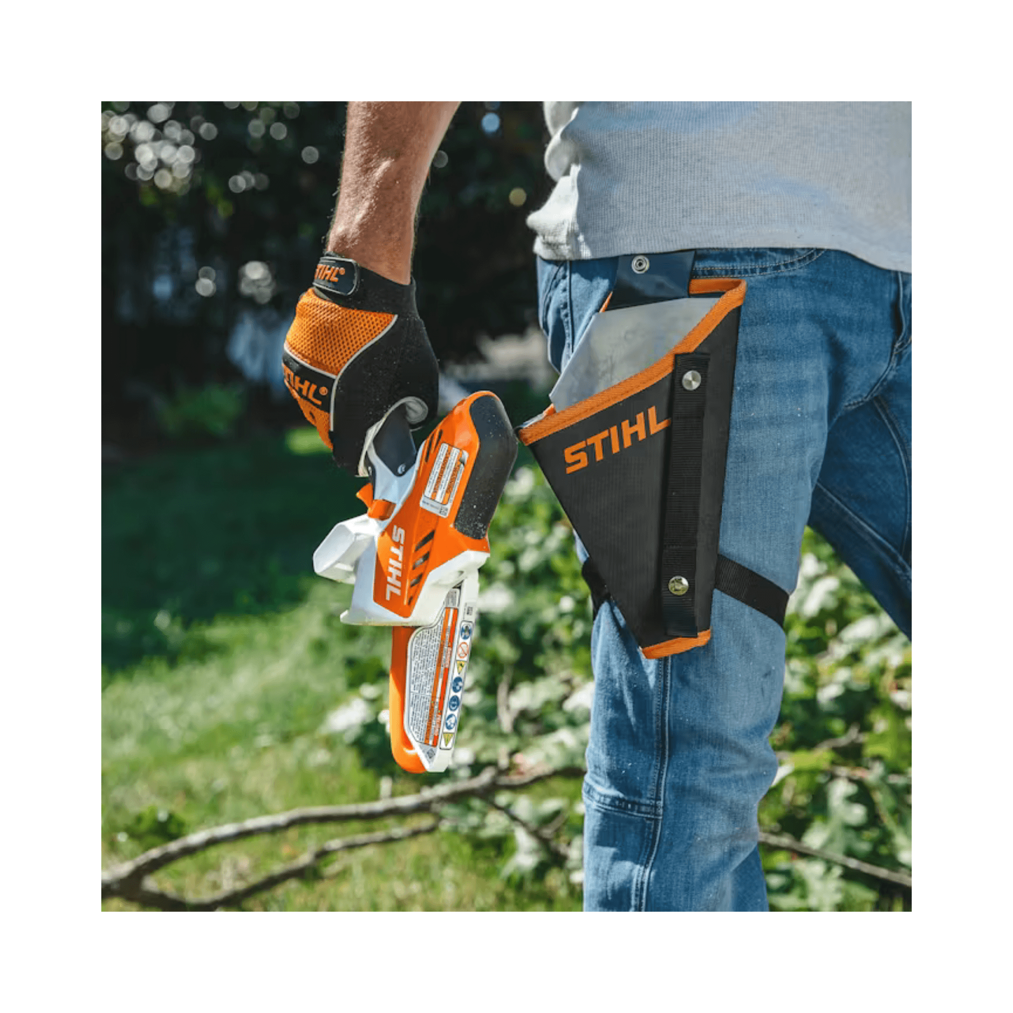 STIHL GTA 26 cordless garden pruner held by a user wearing gloves, showcasing its compact design for tree surgeons.