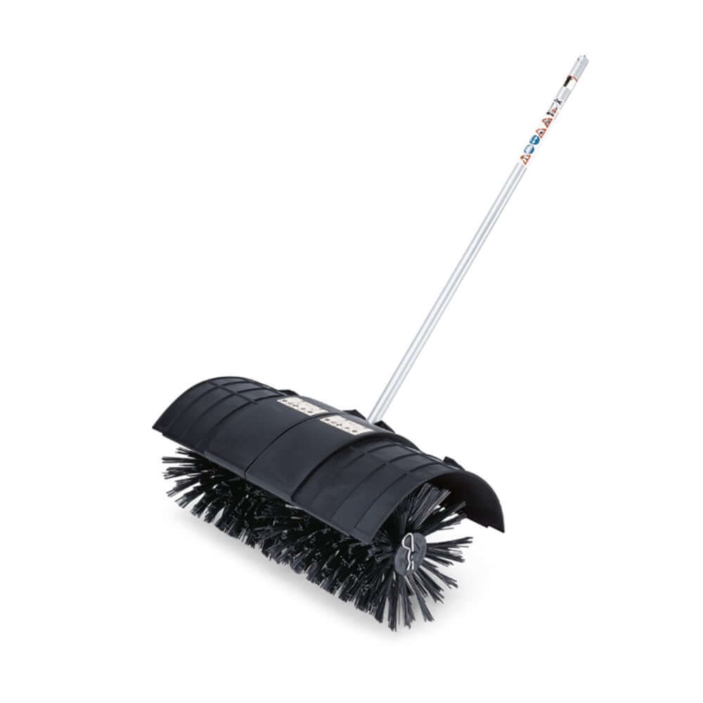 A STIHL KB-KM Kombi Bristle Brush Attachment with a long metal handle and black bristles, designed for sweeping debris.