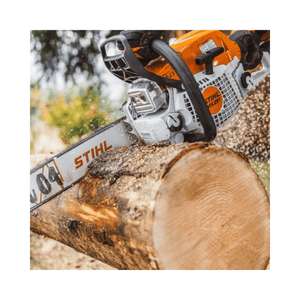 STIHL chainsaw cutting a log with a blurred natural background