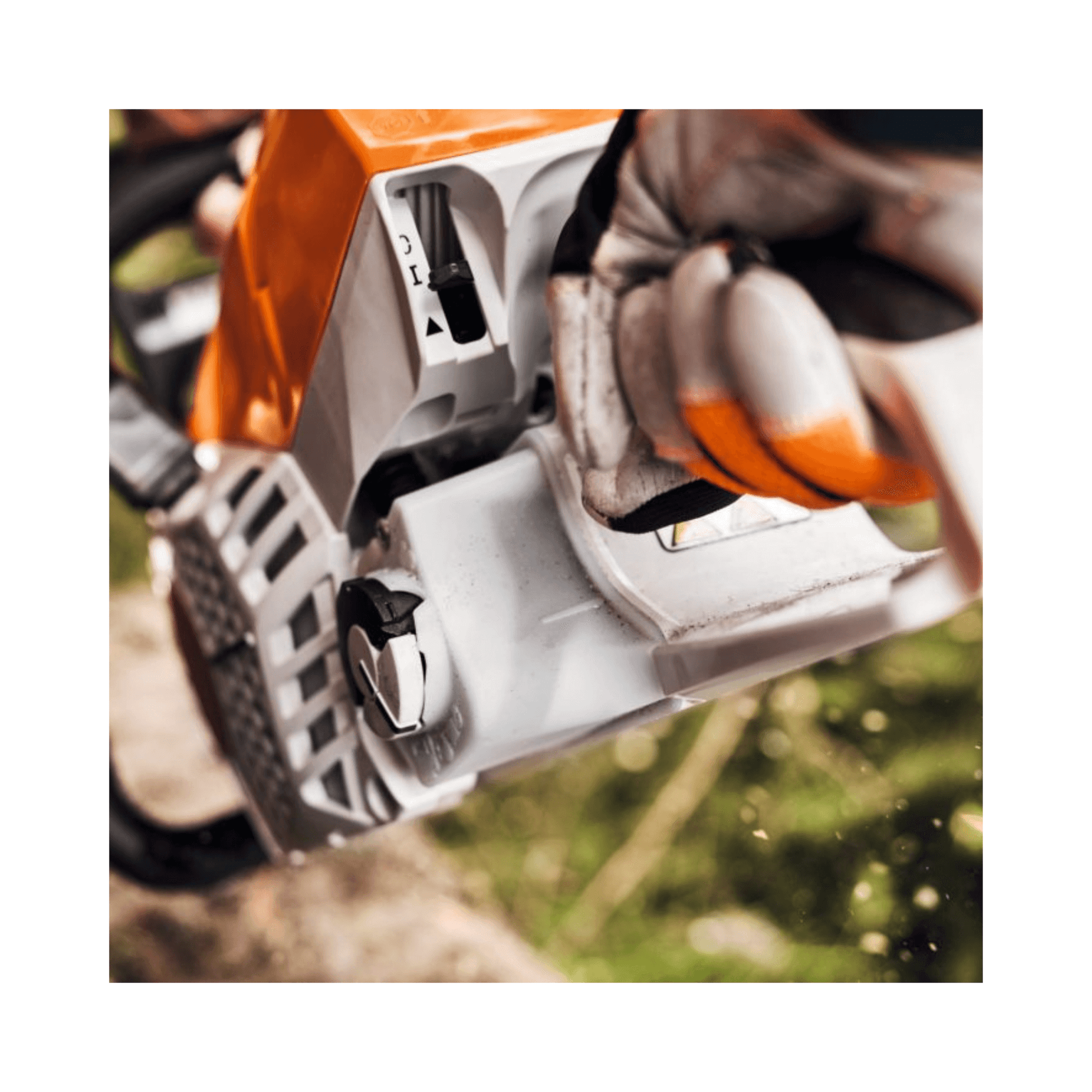 Close-up of the STIHL MS 400.1 C-M chainsaw with focus on the trigger mechanism, ideal for professional tree surgeons.