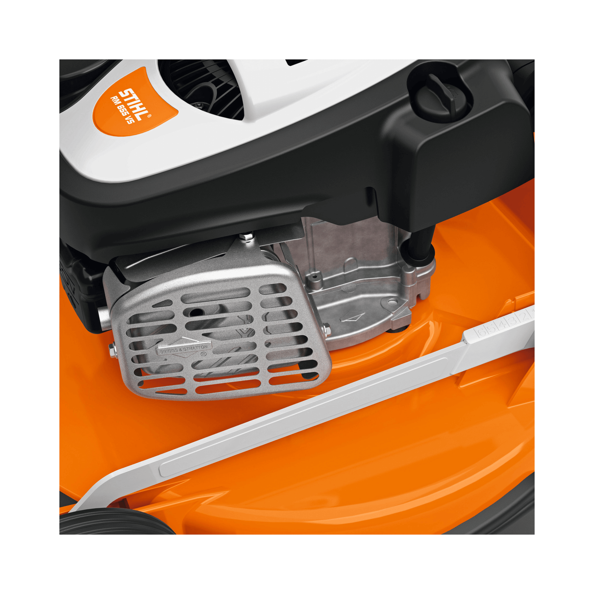 Close-up of the engine and drive components of the RM 655 VS Petrol Lawn Mower by STIHL.