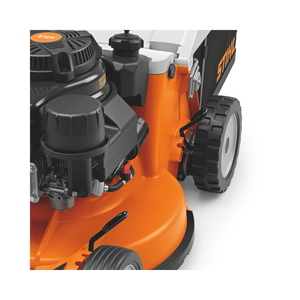 RM 756 YC Petrol Lawn Mower engine and wheel close-up, showcasing powerful performance for large gardens.