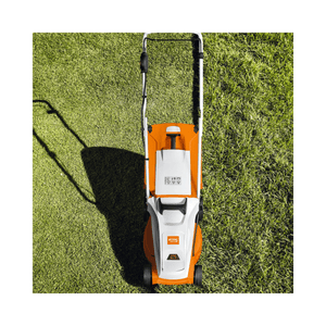 RMA 235 Cordless Lawnmower on grass, showcasing its lightweight and compact design for easy maneuverability.