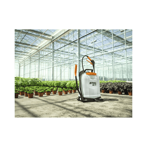 STIHL SG 71 18L backpack sprayer in a greenhouse, ideal for tree surgeons and professional landscaping.