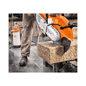 STIHL TSA 500 Cordless Disc Cut-Off Machine 14" cutting through a block with precision during construction work.